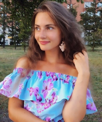 Оля